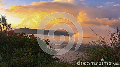 Sunrise on cloudy mount bromo, Indonesia Stock Photo