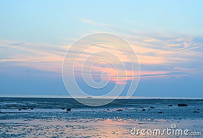 Sunrise with Colorful Sky over Infinite Horizon and Ocean - Vijaynagar Beach, Havelock Island, Andaman, India Stock Photo