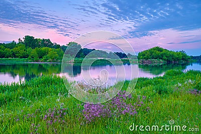 sunrise countryside river flowers sky clouds landscape sunshine Stock Photo