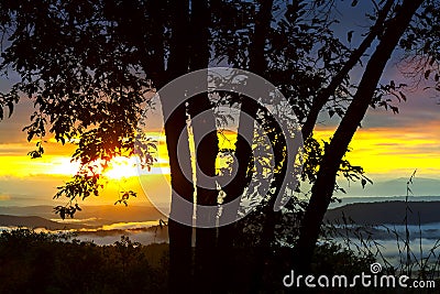 Sunrise dawning at Phu Saun Sai Stock Photo