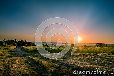 Sunrise at the end of the road. Stock Photo