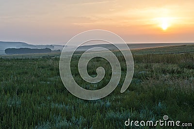 Sunrise and grassland Stock Photo