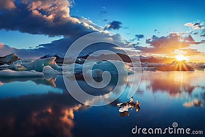 Sunrise in Jokulsarlon. iceland ice lagoon of jokulsarlon in the morning in summer or winter. Blue icebergs Stock Photo