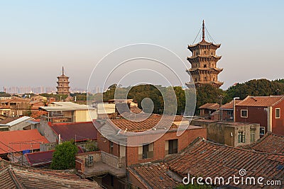 Sunrise landscapes of east and west towers of Kaiyuan Temple, the largest buddhist temple in Fujian Province Stock Photo