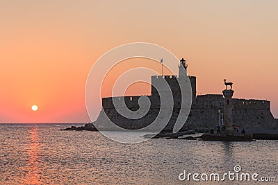 Sunrise in Mandraki harbour. Rhodes, Greece Stock Photo