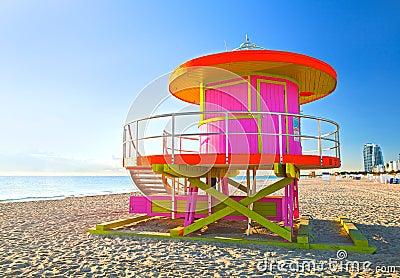 Sunrise in Miami Beach Florida, with a colorful pink lifeguard house Stock Photo