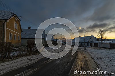 Sunrise near Ctibor and Halze villages in cold snowy morning with chapel Stock Photo