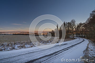 Sunrise near Ctibor and Halze villages in cold snowy morning Stock Photo