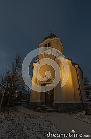 Sunrise near Ctibor and Halze villages in cold snowy morning with chapel Stock Photo