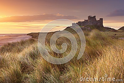 Sunrise over Bamburgh Castle, England Stock Photo