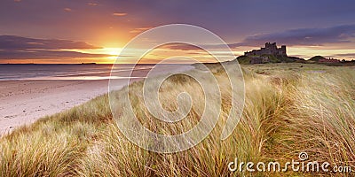 Sunrise over Bamburgh Castle, Northumberland, England Stock Photo