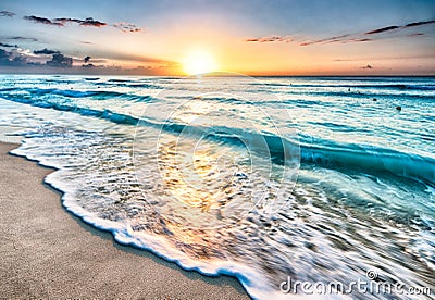 Sunrise over beach in Cancun Stock Photo