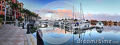 Sunrise over the boats in Esplanade Harbor Marina in Marco Island Editorial Stock Photo