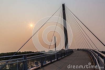 Sunrise over Bob Kerrey pedestrian, foot, bridge Omaha Nebraska USA. Stock Photo