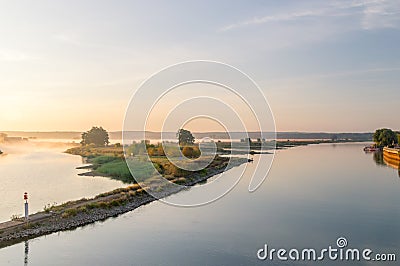 Sunrise over border river Oder. Stock Photo