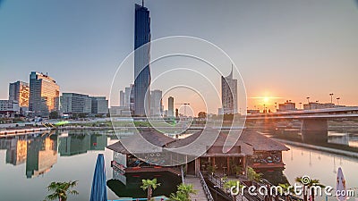 Sunrise over Donaustadt Danube City timelapse is a modern quarter with skyscrapers and business centres in Vienna Stock Photo