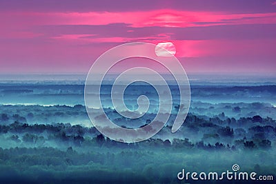 Sunrise over foggy hills. Stock Photo