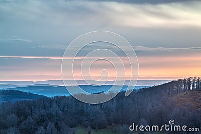 Sunrise over a mountain range Stock Photo