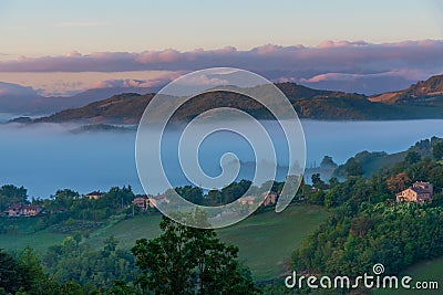 Sunrise over mountainous landscape of Marche region near Urbino, Stock Photo