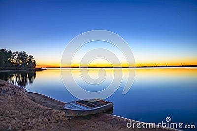Sunrise over a natural lake Stock Photo