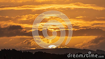 Sunrise over reedbeds looking towards Poole Harbour from Swineham Point near Wareham, Dorset Stock Photo