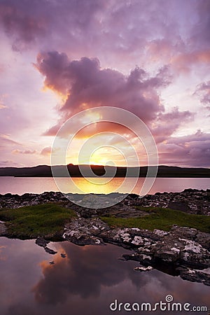 Sunrise over Scottish Loch Stock Photo