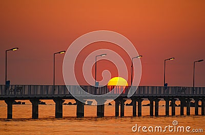 sunrise over the wooden footbridge Stock Photo