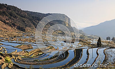 Sunrise over YuanYang rice terraces in Yunnan, China, one of the latest UNESCO World Heritage Sites Stock Photo