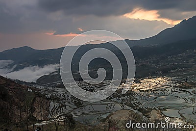 Sunrise over YuanYang rice terraces in Yunnan, China, one of the latest UNESCO World Heritage Sites Stock Photo