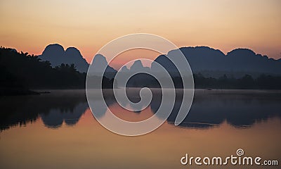 Sunrise panorama sillhouette mountain and river Stock Photo