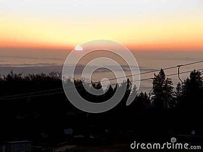 Sunrise at the pohorje mountain above maribor in slovenia Stock Photo