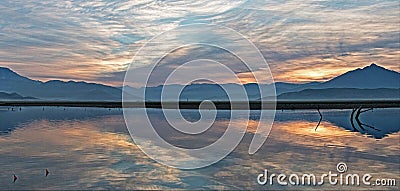 Sunrise reflections on drought stricken Lake Isabella in the southern Sierra Nevada mountains of California Stock Photo