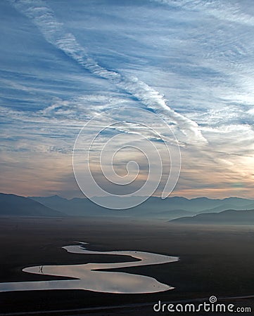 Sunrise reflections on drought stricken Lake Isabella in the southern Sierra Nevada mountains of California Stock Photo