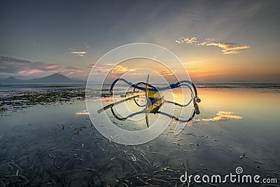 Sunrise at Sanur beach Bali Indonesia. Stock Photo