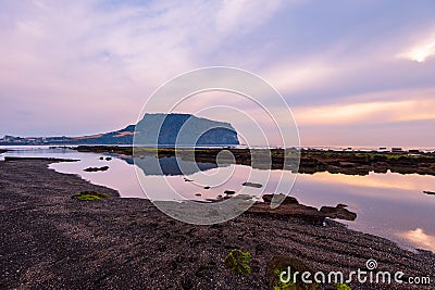 Sunrise at Seongsan ilchulbong in Jeju island,South Korea Stock Photo