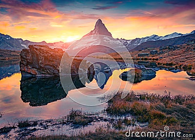 Sunrise Stellisee lake with Matterhorn peak on background. Stock Photo