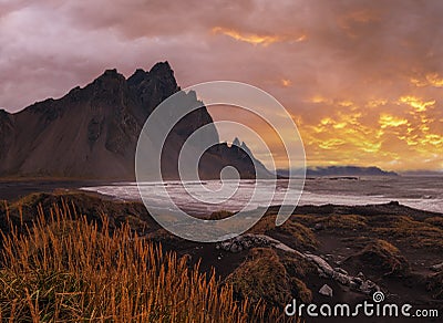 Sunrise Stokksnes cape sea beach and Vestrahorn Mountain, Iceland. Amazing nature scenery, popular travel destination. Autumn Stock Photo