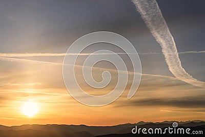 Sunrise sun mountains halo sky Stock Photo