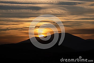 Sunrise, sunset over mountains silhouette background. Wallpaper, card Stock Photo