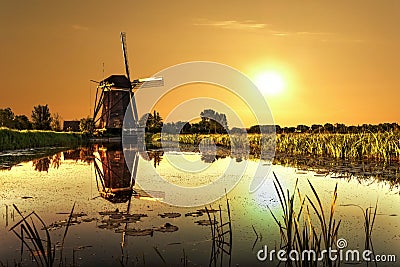 Sunrise on a Windmill Stock Photo