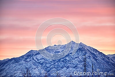 Sunrise of Winter panoramic, view of Snow capped Wasatch Front Rocky Mountains, Great Salt Lake Valley and Cloudscape from the Mou Stock Photo