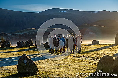 Sunrise at the Winter solstice at Castlerigg Stone Circle near Keswick in Cumbria Editorial Stock Photo