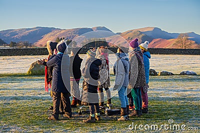 Sunrise at the Winter solstice at Castlerigg Stone Circle near Keswick in Cumbria Editorial Stock Photo