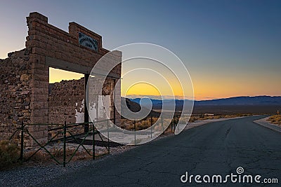 Sunset above building ruins in Rhyolite, Nevada Editorial Stock Photo