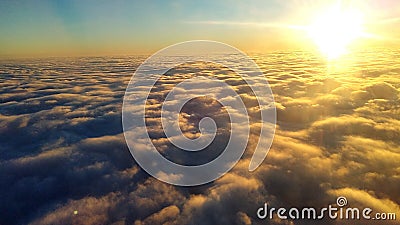 Sunset above the clouds Stock Photo