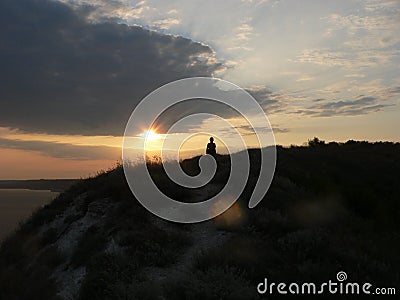 Sunset above the sea. Orange sky. Stock Photo