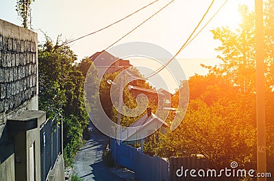 Sunset above a small sea town Stock Photo
