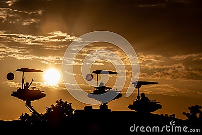 Sunset on a amusement park, kids joyful Stock Photo