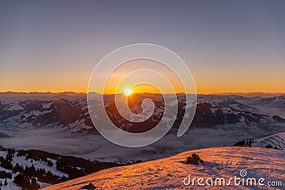 Sunset at Austrian Mountain Range in Winter Stock Photo