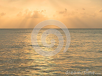 Sunset background. Inspirational nature calm sea reflect with beautiful sky twilight evening golden orange cloud dramatic sunset Stock Photo